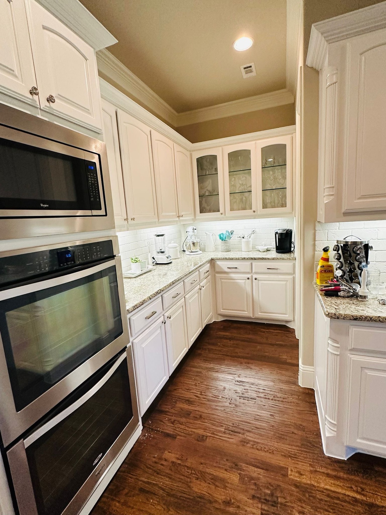 Kitchen cabinets refinished by Mayer and Lemos Home Solutions