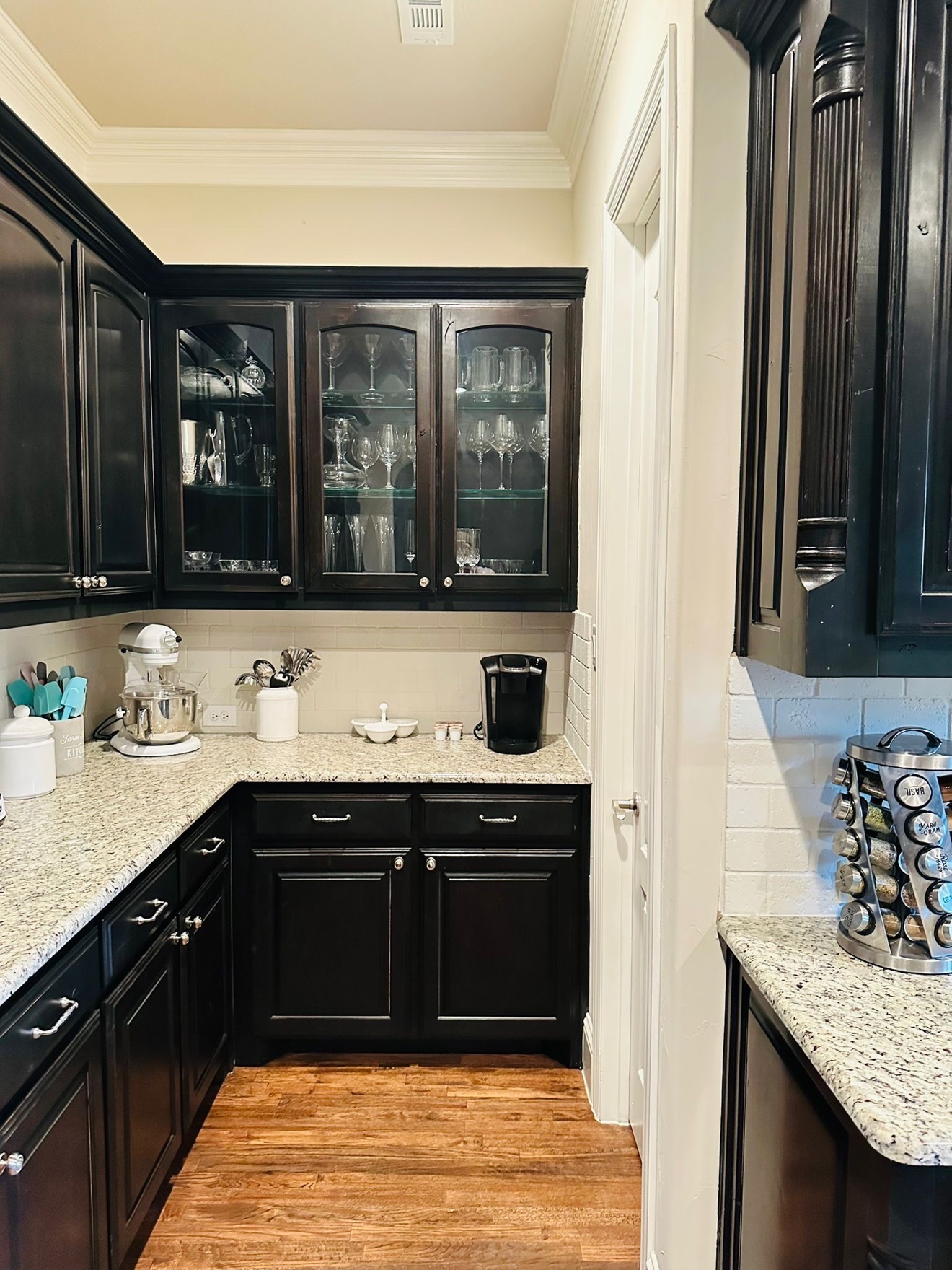 Dark kitchen cabinets before refinishing