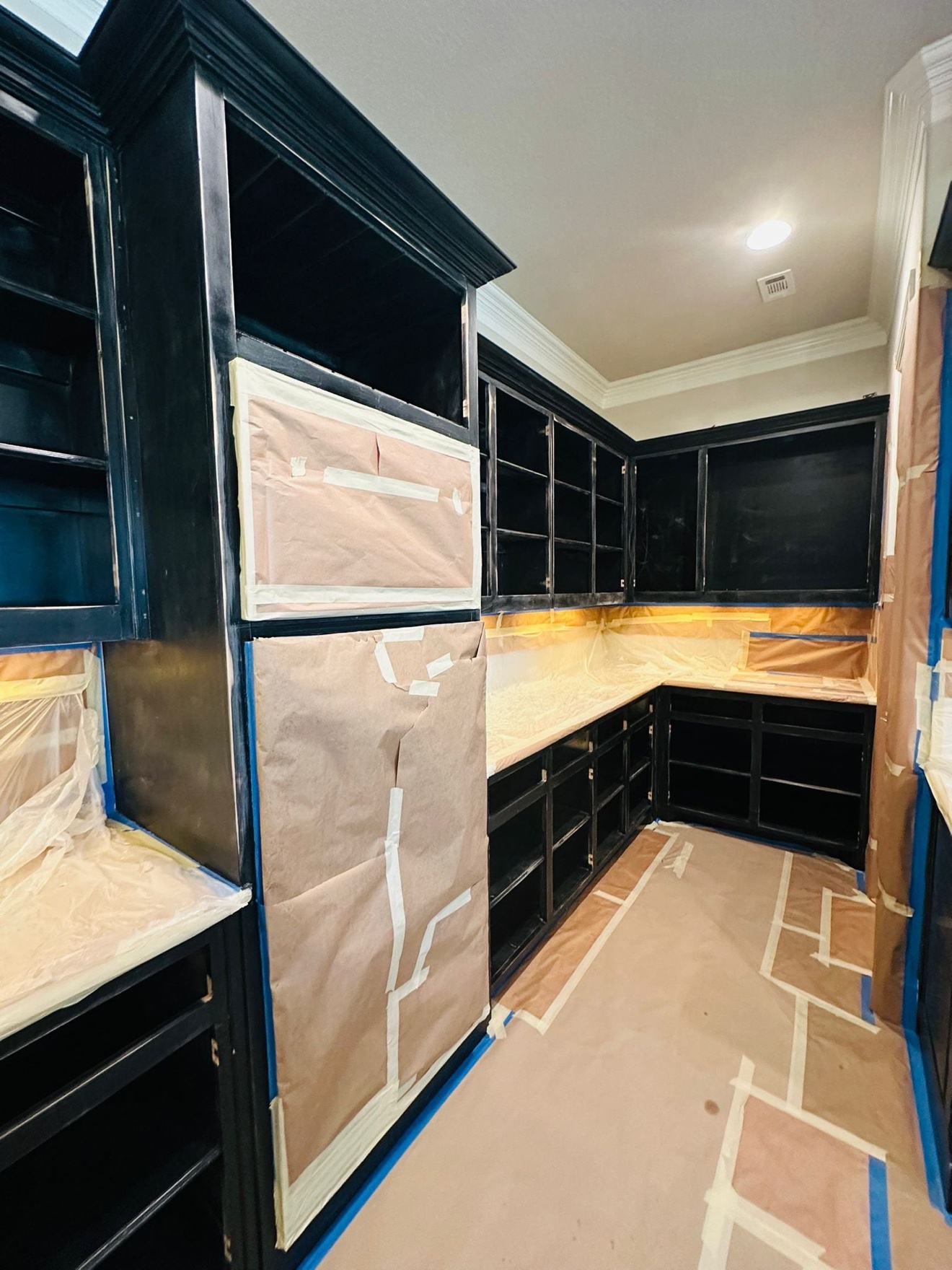 Kitchen protected and prepared during cabinet refinishing